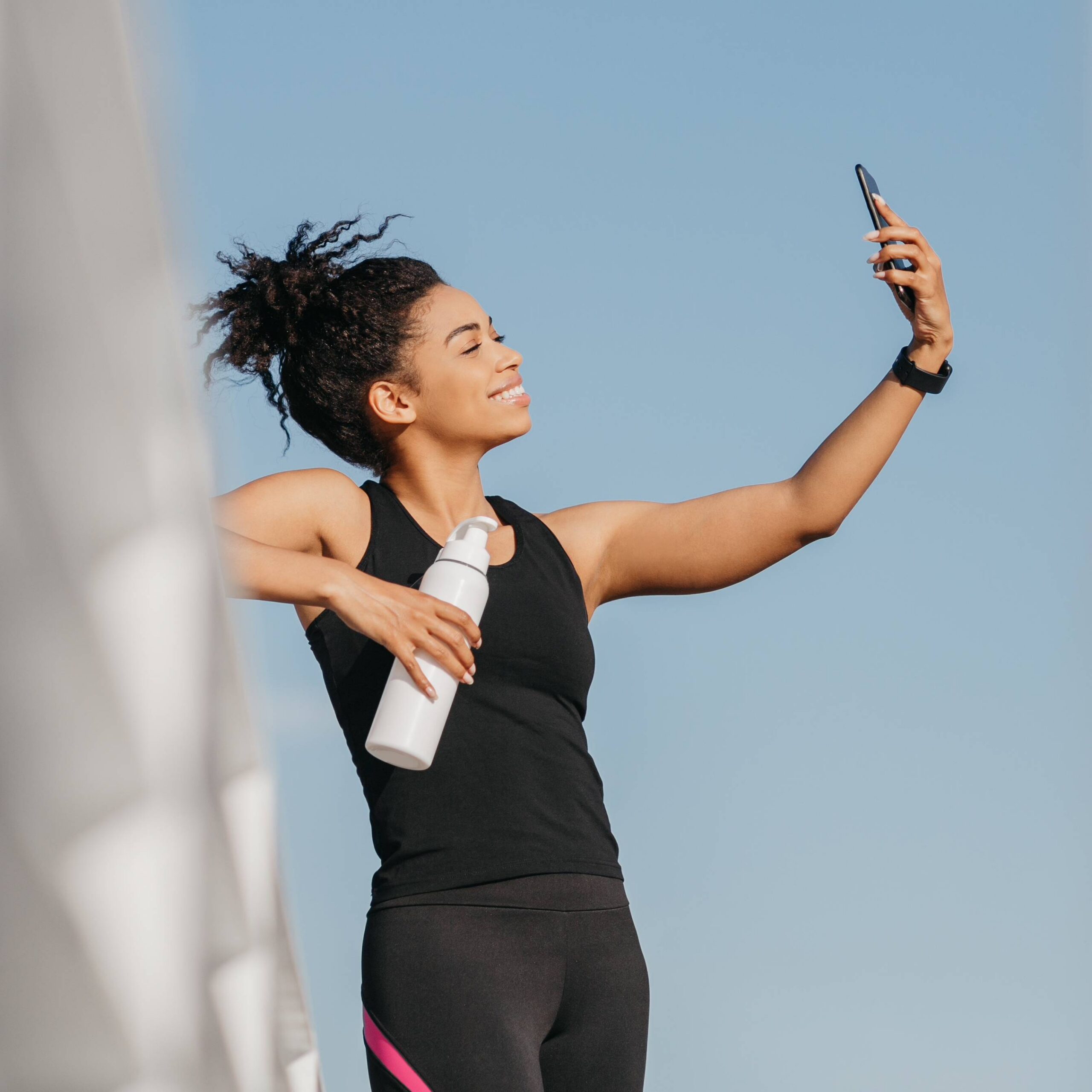 goedathletic woman taking selfie outdoors on sunny day 2026 10 06 20 26 06 utc